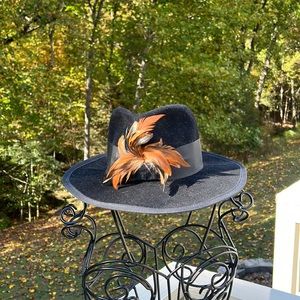 Women’s Hat with Feather Embellishment